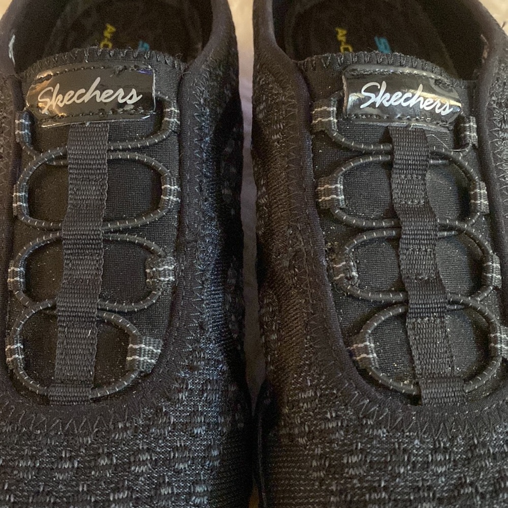 Skechers black sneakers
